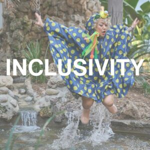 Dancer jumping in a pond. Image text reads "inclusivity."